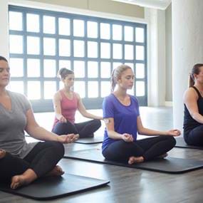 RefreshinQ group of women in yoga class lifestyle photography
